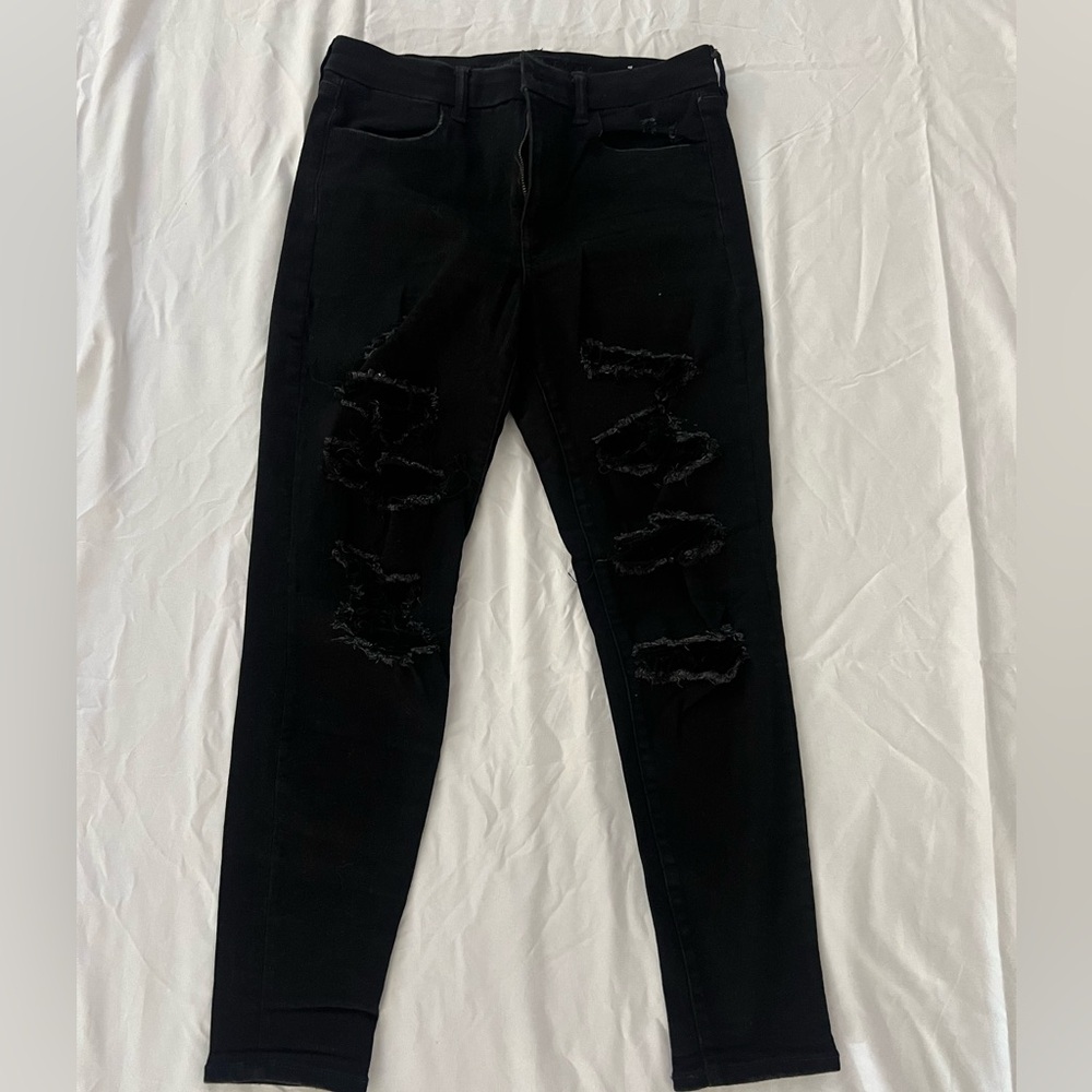 American Eagle black ripped jeans. Lightly worn. Size 10 regular.